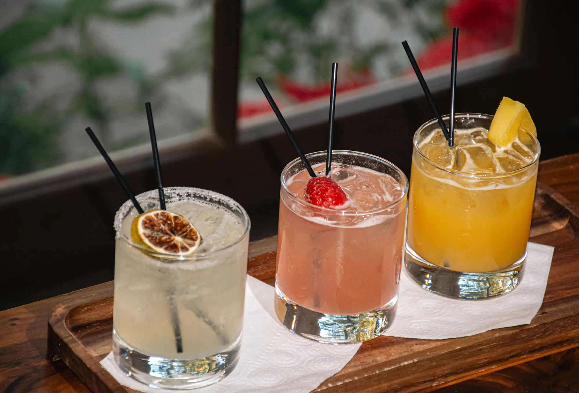 Lobster tail plated over steak at a banquet table