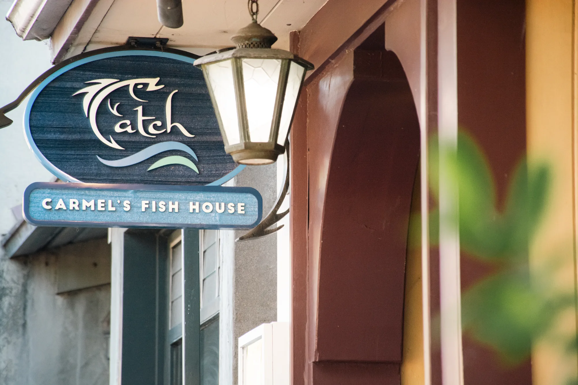 Caviar spoons with chilled vodka shots at a set table